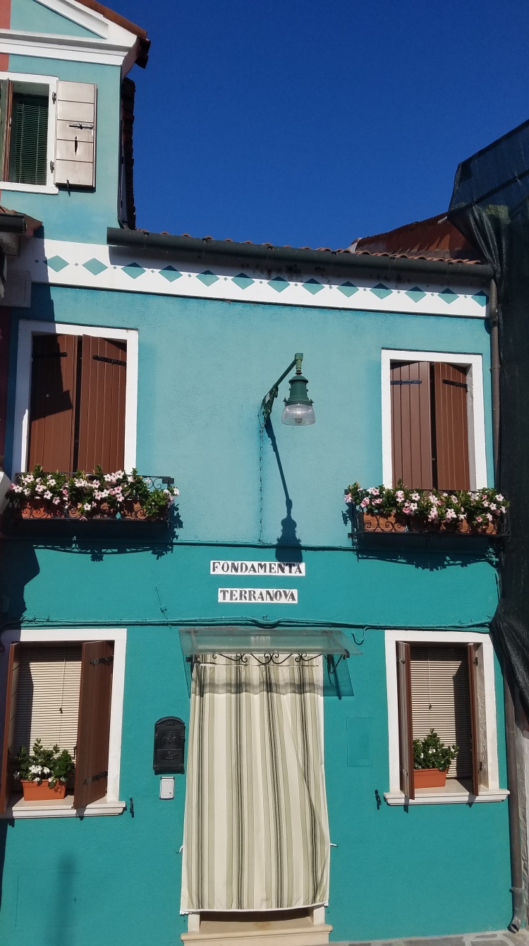 Teal building in Burano, Italy